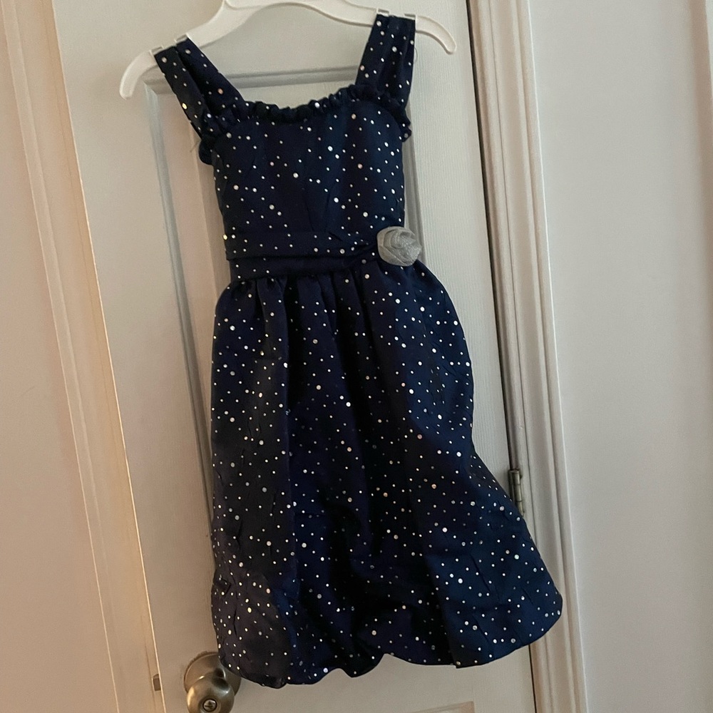 Girls Navy blue sequin dress.  Size 6x but fits like 6. No rips no stains.